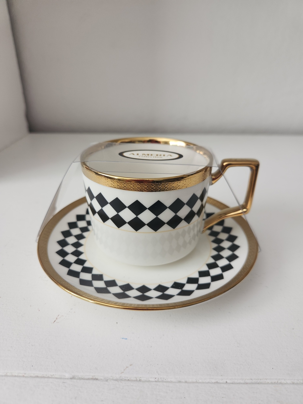 Amedea Black & Gold Porcelain Teacup and Saucer Set